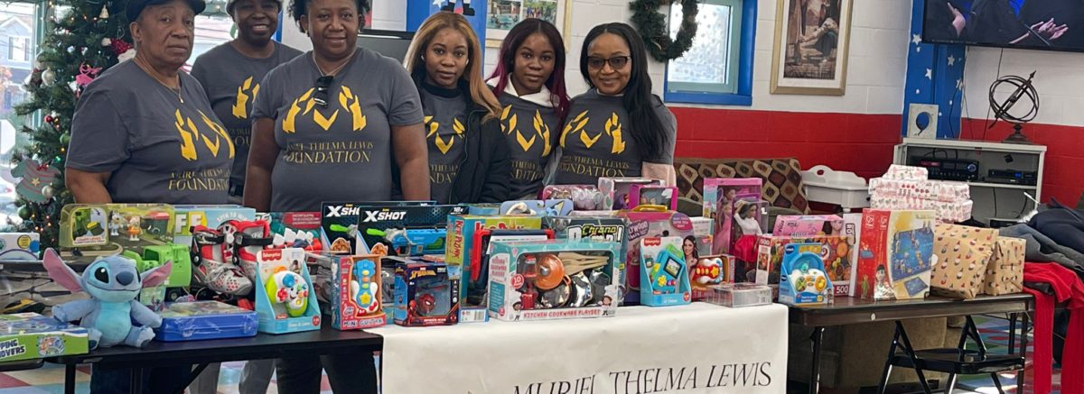 The Muriel Thelma Lewis Foundation table giving away toys